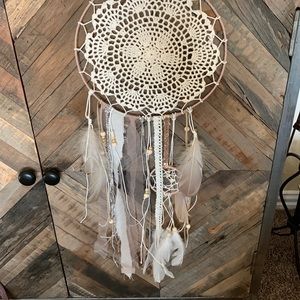 Beautiful BOHO dream catcher. Leather hook added so you can easily hang it.